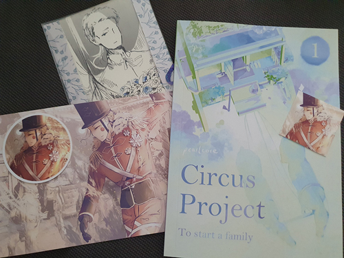 Stickers, a print and the first volume of circus project, an doujinshi of artist pearlcore