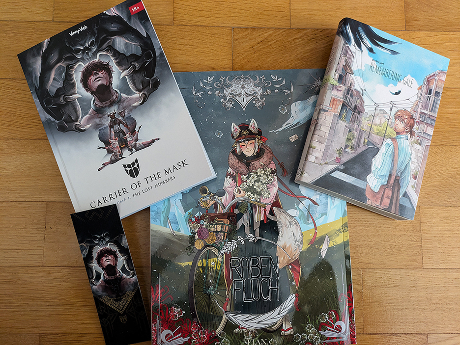 photo of three indie manga: Carrier of the Mask volume 4 by Vinnie Vieh, Rabenfluch volume 3 by Lian and Remembering Gale by pushart
